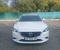 Белый Мазда 6, объемом двигателя 2.49 л и пробегом 124 тыс. км за 15500 $, фото 1 на Automoto.ua