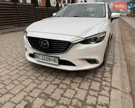 Белый Мазда 6, объемом двигателя 2.49 л и пробегом 66 тыс. км за 19000 $, фото 1 на Automoto.ua