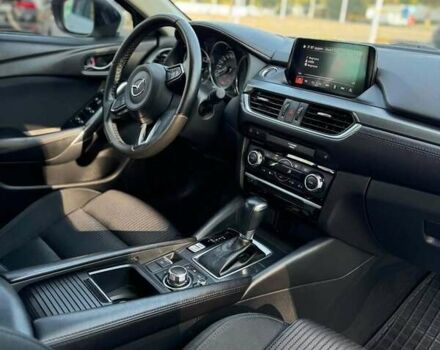 Білий Мазда 6, об'ємом двигуна 2 л та пробігом 123 тис. км за 16800 $, фото 7 на Automoto.ua