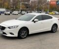 Білий Мазда 6, об'ємом двигуна 2 л та пробігом 112 тис. км за 17900 $, фото 13 на Automoto.ua