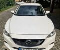 Білий Мазда 6, об'ємом двигуна 2 л та пробігом 115 тис. км за 16900 $, фото 7 на Automoto.ua