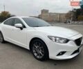 Білий Мазда 6, об'ємом двигуна 2 л та пробігом 112 тис. км за 17000 $, фото 14 на Automoto.ua