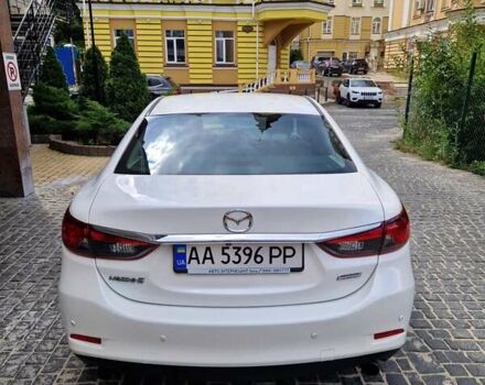 Білий Мазда 6, об'ємом двигуна 2 л та пробігом 115 тис. км за 16900 $, фото 5 на Automoto.ua
