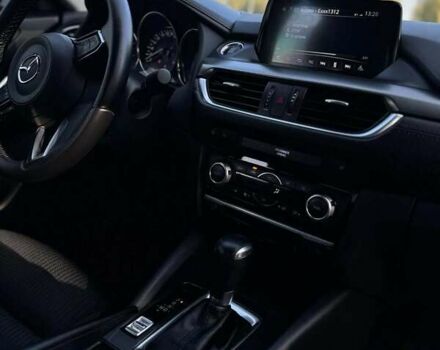 Білий Мазда 6, об'ємом двигуна 2 л та пробігом 123 тис. км за 16800 $, фото 8 на Automoto.ua