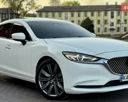 Белый Мазда 6, объемом двигателя 2.49 л и пробегом 89 тыс. км за 19000 $, фото 1 на Automoto.ua