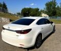 Білий Мазда 6, об'ємом двигуна 2 л та пробігом 28 тис. км за 23300 $, фото 4 на Automoto.ua