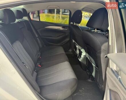 Білий Мазда 6, об'ємом двигуна 2 л та пробігом 134 тис. км за 20490 $, фото 10 на Automoto.ua