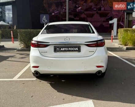 Білий Мазда 6, об'ємом двигуна 2 л та пробігом 134 тис. км за 20490 $, фото 4 на Automoto.ua