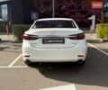 Білий Мазда 6, об'ємом двигуна 2 л та пробігом 134 тис. км за 20490 $, фото 4 на Automoto.ua