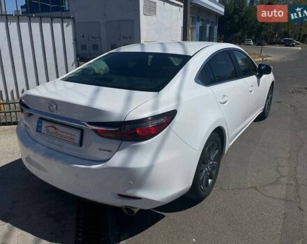 Білий Мазда 6, об'ємом двигуна 2 л та пробігом 85 тис. км за 18999 $, фото 3 на Automoto.ua