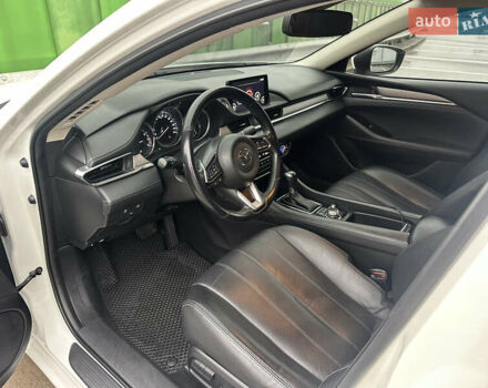 Білий Мазда 6, об'ємом двигуна 2.49 л та пробігом 148 тис. км за 15700 $, фото 18 на Automoto.ua