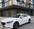 Білий Мазда 6, об'ємом двигуна 2 л та пробігом 144 тис. км за 18600 $, фото 1 на Automoto.ua