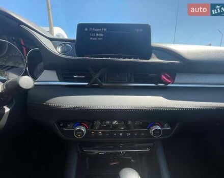 Білий Мазда 6, об'ємом двигуна 2 л та пробігом 85 тис. км за 18999 $, фото 12 на Automoto.ua
