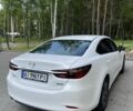 Белый Мазда 6, объемом двигателя 2 л и пробегом 100 тыс. км за 19500 $, фото 1 на Automoto.ua