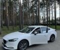 Белый Мазда 6, объемом двигателя 2 л и пробегом 100 тыс. км за 19500 $, фото 1 на Automoto.ua