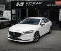 Белый Мазда 6, объемом двигателя 2 л и пробегом 144 тыс. км за 17990 $, фото 1 на Automoto.ua