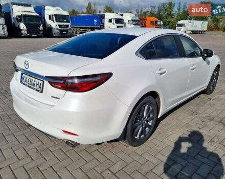 Білий Мазда 6, об'ємом двигуна 2 л та пробігом 51 тис. км за 25500 $, фото 18 на Automoto.ua