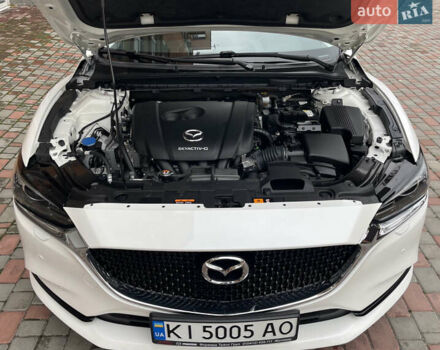 Білий Мазда 6, об'ємом двигуна 2 л та пробігом 22 тис. км за 23400 $, фото 18 на Automoto.ua