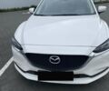 Белый Мазда 6, объемом двигателя 2 л и пробегом 100 тыс. км за 23952 $, фото 1 на Automoto.ua