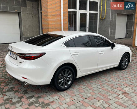 Білий Мазда 6, об'ємом двигуна 2 л та пробігом 22 тис. км за 23400 $, фото 7 на Automoto.ua