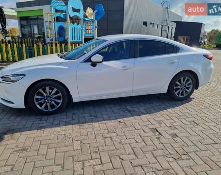 Білий Мазда 6, об'ємом двигуна 2 л та пробігом 51 тис. км за 25500 $, фото 12 на Automoto.ua