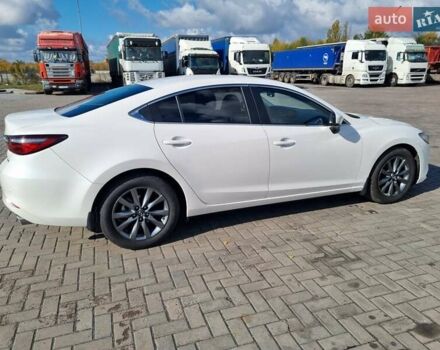 Білий Мазда 6, об'ємом двигуна 2 л та пробігом 51 тис. км за 25500 $, фото 17 на Automoto.ua