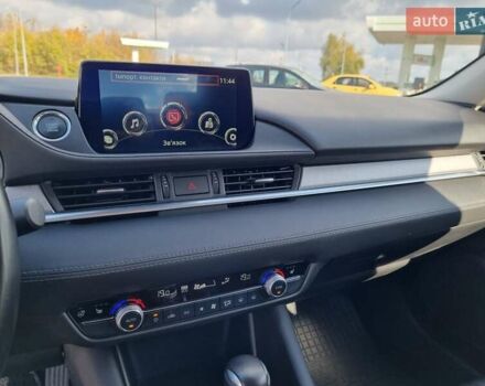 Білий Мазда 6, об'ємом двигуна 2 л та пробігом 51 тис. км за 25500 $, фото 26 на Automoto.ua