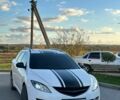 Белый Мазда 6, объемом двигателя 2 л и пробегом 338 тыс. км за 6000 $, фото 2 на Automoto.ua