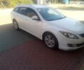 Белый Мазда 6, объемом двигателя 2 л и пробегом 300 тыс. км за 6400 $, фото 1 на Automoto.ua