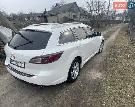 Білий Мазда 6, об'ємом двигуна 2 л та пробігом 335 тис. км за 5500 $, фото 7 на Automoto.ua