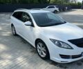 Белый Мазда 6, объемом двигателя 2 л и пробегом 252 тыс. км за 6900 $, фото 1 на Automoto.ua
