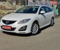 Белый Мазда 6, объемом двигателя 2 л и пробегом 210 тыс. км за 7900 $, фото 1 на Automoto.ua