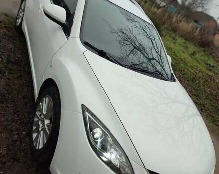 Белый Мазда 6, объемом двигателя 2 л и пробегом 295 тыс. км за 7200 $, фото 1 на Automoto.ua