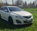 Білий Мазда 6, об'ємом двигуна 2.2 л та пробігом 246 тис. км за 9000 $, фото 33 на Automoto.ua