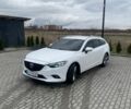 Белый Мазда 6, объемом двигателя 2.18 л и пробегом 252 тыс. км за 9600 $, фото 1 на Automoto.ua