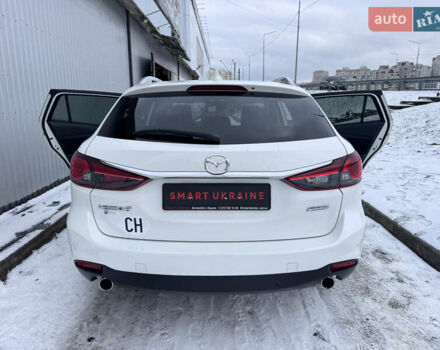 Білий Мазда 6, об'ємом двигуна 2.18 л та пробігом 199 тис. км за 11950 $, фото 40 на Automoto.ua