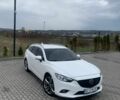 Белый Мазда 6, объемом двигателя 2.18 л и пробегом 252 тыс. км за 9600 $, фото 1 на Automoto.ua