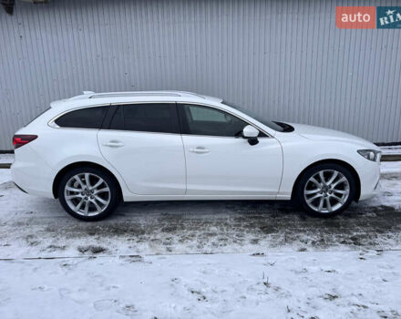 Білий Мазда 6, об'ємом двигуна 2.18 л та пробігом 199 тис. км за 11950 $, фото 1 на Automoto.ua