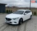 Белый Мазда 6, объемом двигателя 2.18 л и пробегом 252 тыс. км за 10200 $, фото 1 на Automoto.ua
