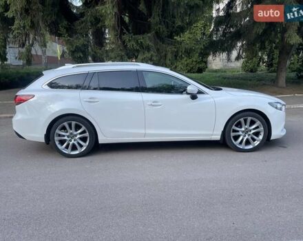 Білий Мазда 6, об'ємом двигуна 2.18 л та пробігом 263 тис. км за 9900 $, фото 13 на Automoto.ua