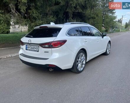 Білий Мазда 6, об'ємом двигуна 2.18 л та пробігом 263 тис. км за 9900 $, фото 12 на Automoto.ua