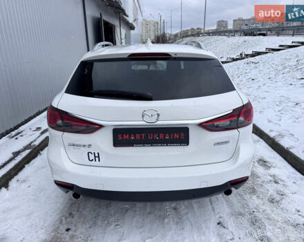 Білий Мазда 6, об'ємом двигуна 2.18 л та пробігом 199 тис. км за 11950 $, фото 4 на Automoto.ua