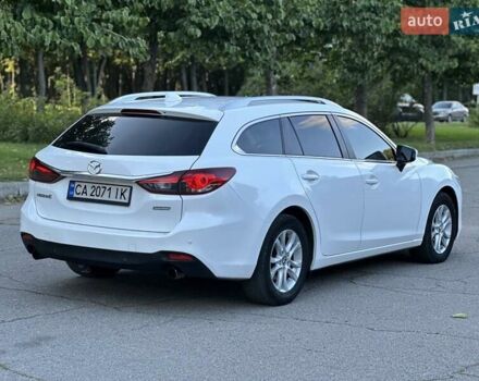 Белый Мазда 6, объемом двигателя 2.19 л и пробегом 225 тыс. км за 10900 $, фото 6 на Automoto.ua