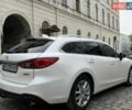 Білий Мазда 6, об'ємом двигуна 2.19 л та пробігом 239 тис. км за 10999 $, фото 7 на Automoto.ua