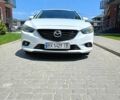 Белый Мазда 6, объемом двигателя 2.2 л и пробегом 215 тыс. км за 11200 $, фото 1 на Automoto.ua