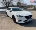 Білий Мазда 6, об'ємом двигуна 2.18 л та пробігом 216 тис. км за 10800 $, фото 2 на Automoto.ua