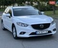 Белый Мазда 6, объемом двигателя 2.19 л и пробегом 225 тыс. км за 10900 $, фото 1 на Automoto.ua
