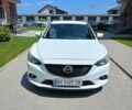 Білий Мазда 6, об'ємом двигуна 2.2 л та пробігом 215 тис. км за 11200 $, фото 1 на Automoto.ua