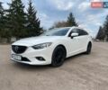 Білий Мазда 6, об'ємом двигуна 2.18 л та пробігом 216 тис. км за 10800 $, фото 1 на Automoto.ua