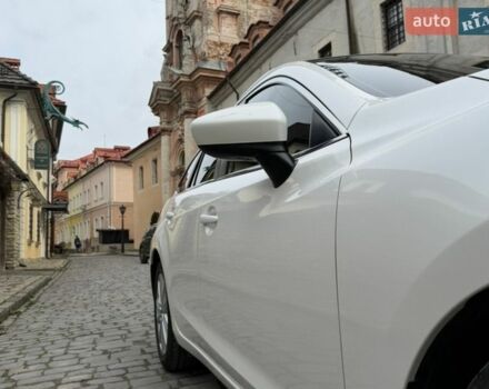 Білий Мазда 6, об'ємом двигуна 2.19 л та пробігом 239 тис. км за 10999 $, фото 26 на Automoto.ua